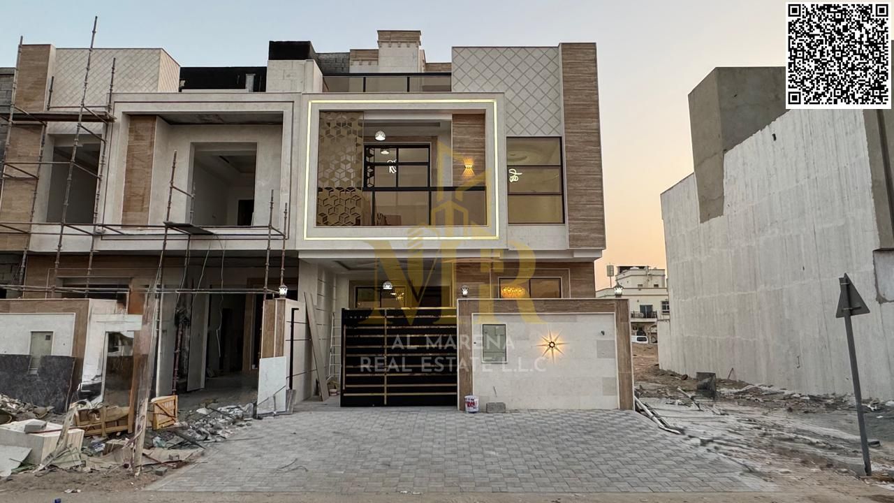 Luxury villa for sale in Al Yasmin neighborhood – modern design, spacious areas with a private roof terrace