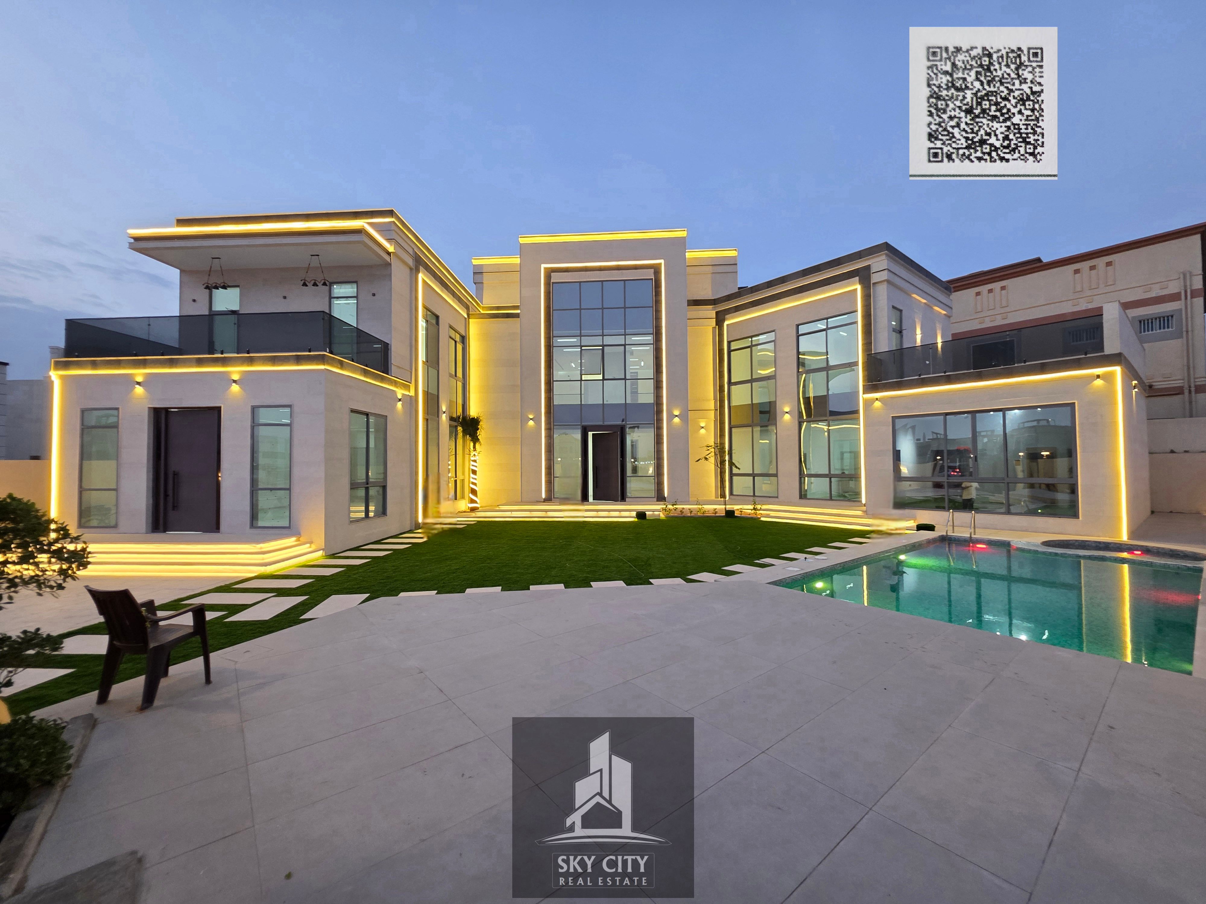 Al Yasmin, opposite Al Rahmaniya and Sharjah Sustainable City. Ground floor, first floor, and roof. Central air conditioning with a yard and swimming pool. 7 master bedrooms, majlis, 2 living rooms, maid's room with jacuzzi and sauna, and gym. Ready to mo