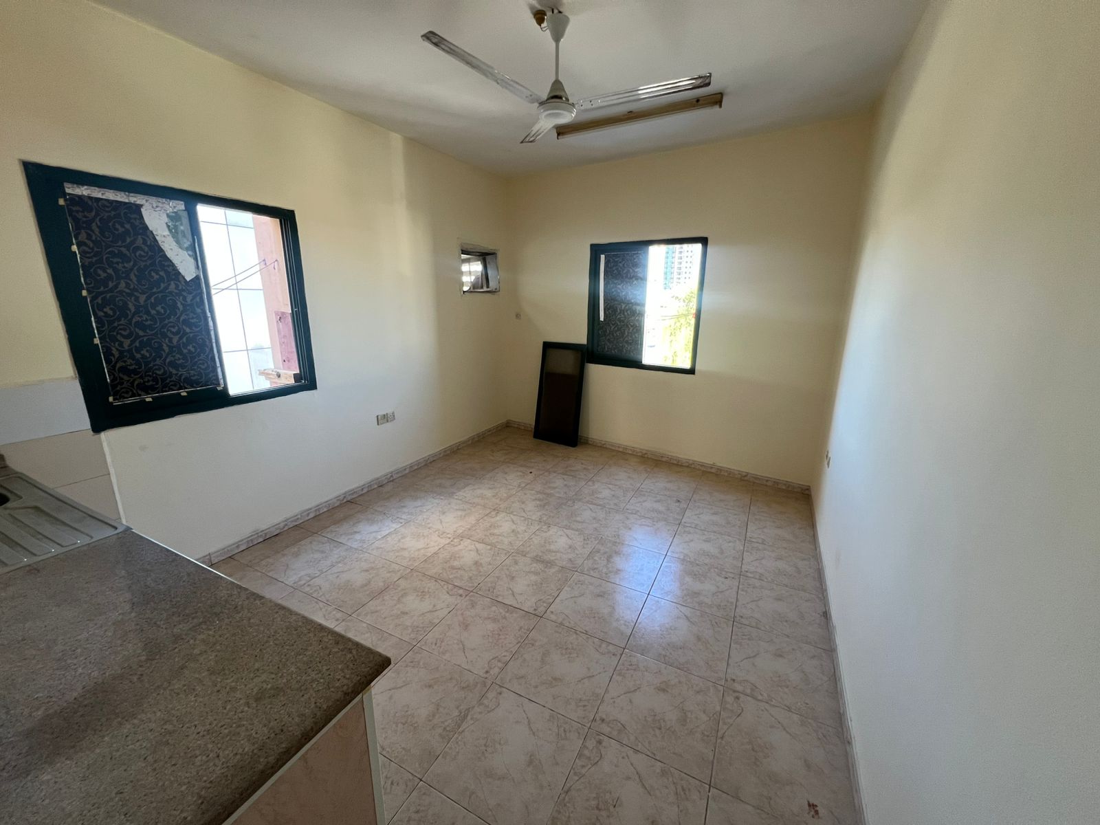 A studio apartment is available for annual rent in a prime location in Al Rashidiya 1, next to the Fish Market area, one of the vital and sought-after