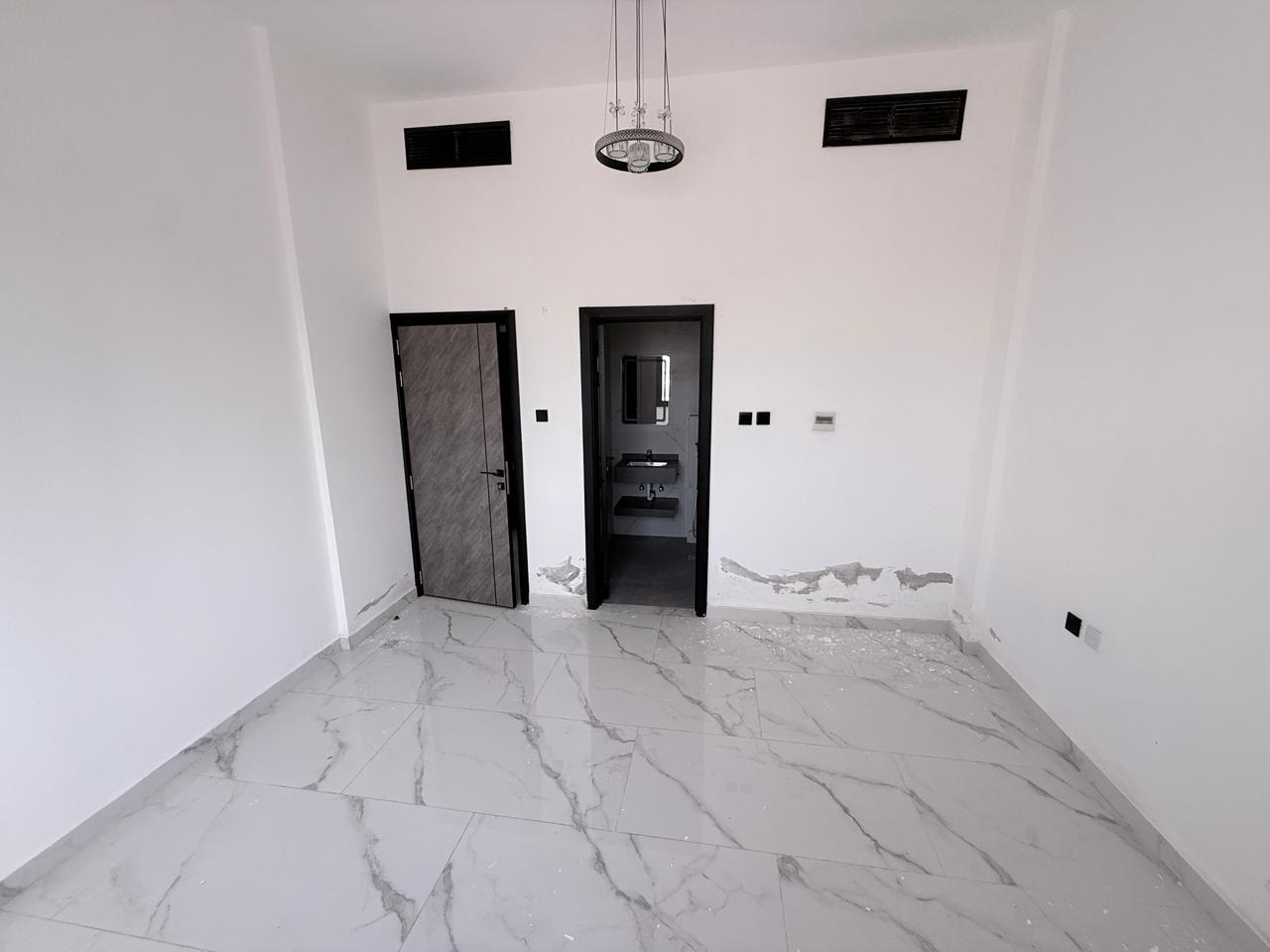 A distinctive apartment with a spacious area and excellent finishing, located in the Al-Aliya area of Ajman, second occupant, ground floor, designat