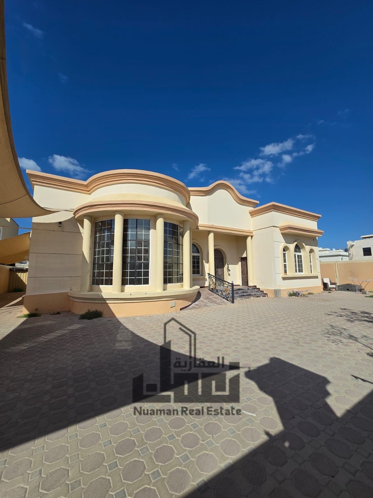 Luxury Villa for Sale in Al Nakhilaat on Main Street 36 with 3 Master Bedrooms, Majlis, Two Living Halls, Maid Room, Shaded Parking
