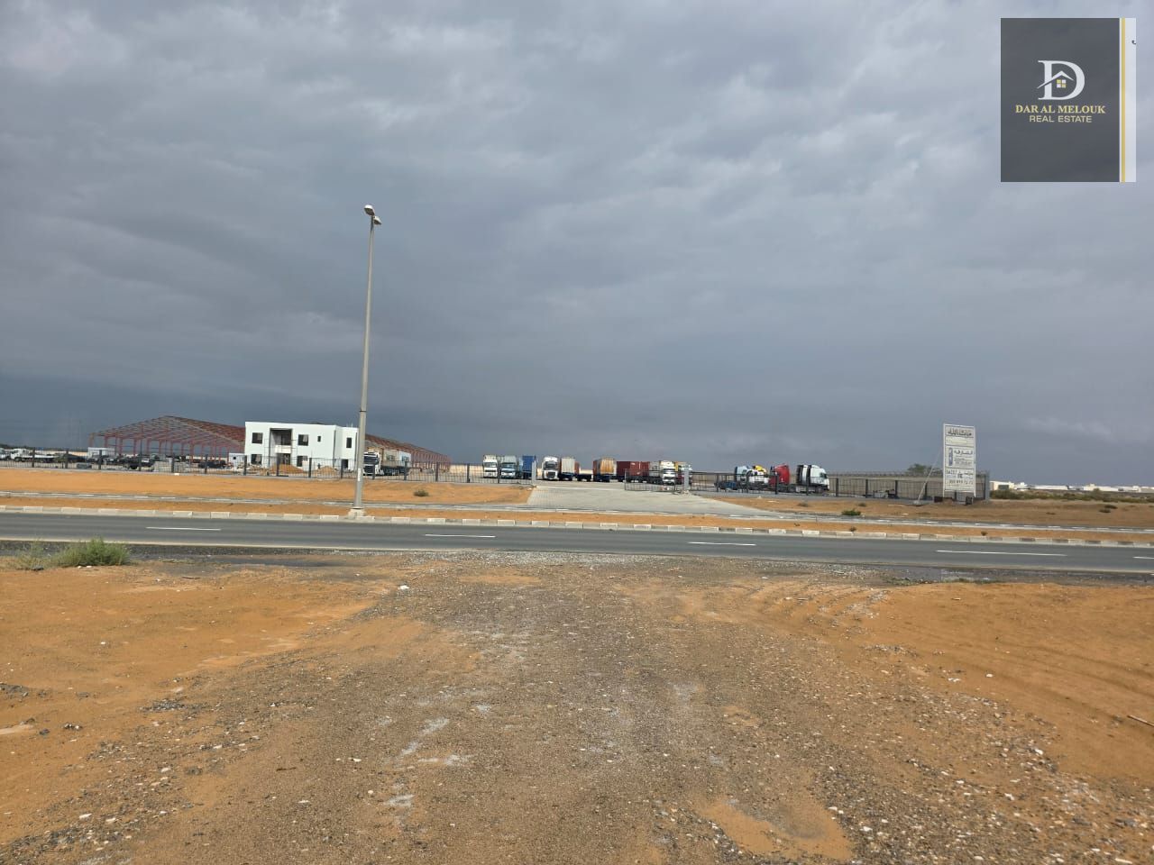 For sale in Sharjah, Al Sajaa area A plot of land 17,100 sq ft Consisting of a room and bathroom and an office with interlocking flooring