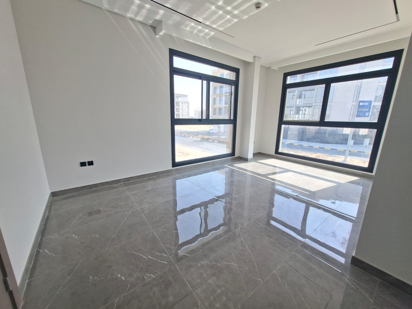 Brand new apartment with balcony with master room parking prim location tilal city shraja