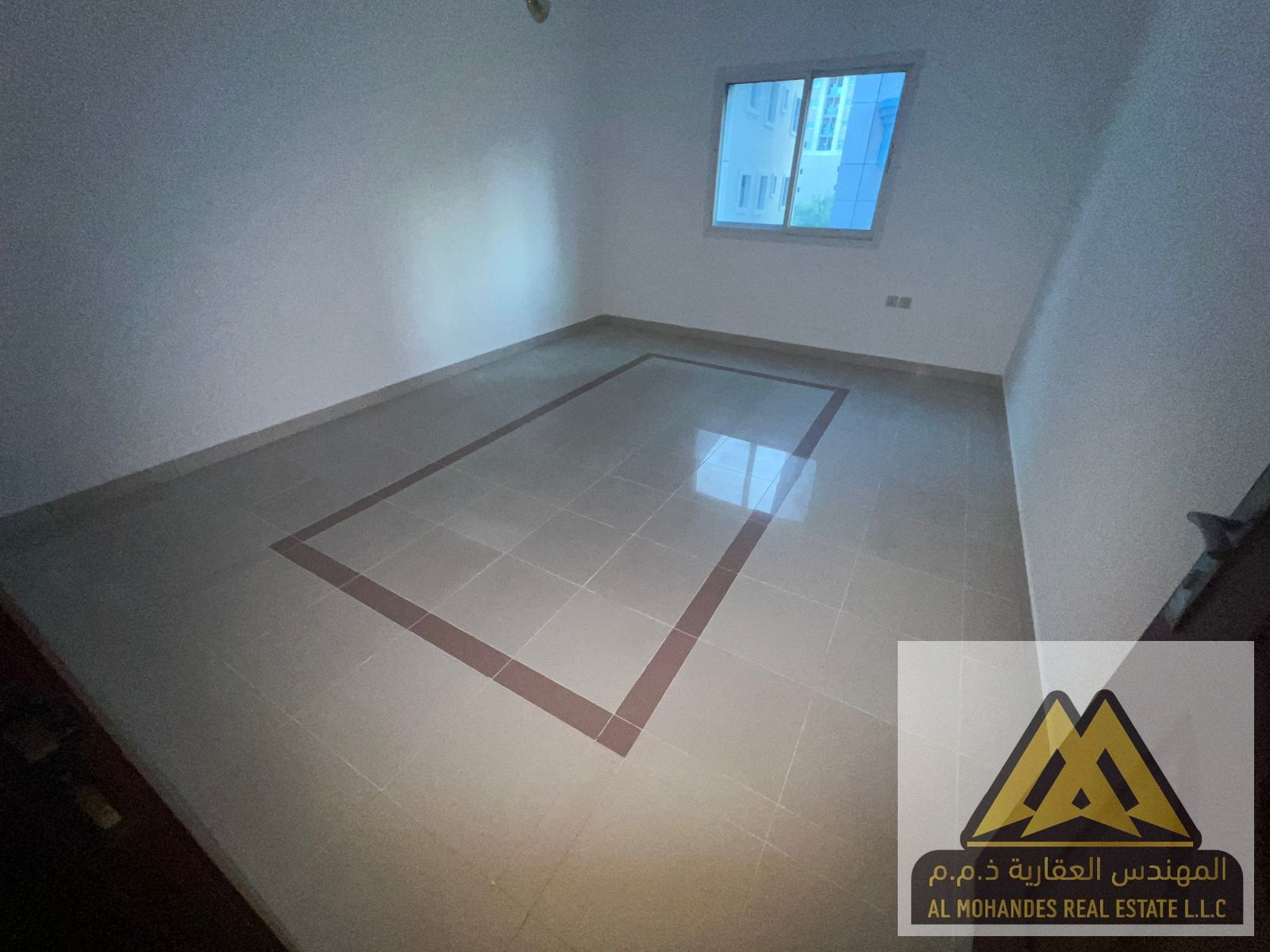 Spacious Apartment for Rent in Al Rumaila – Prime Location for Families