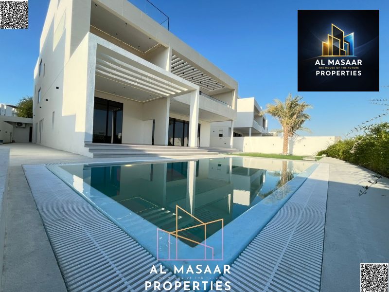 Villa for sale in Al Zorah, golf course complex, in the heart of nature, with a direct view of the lake and golf courses and a large area.