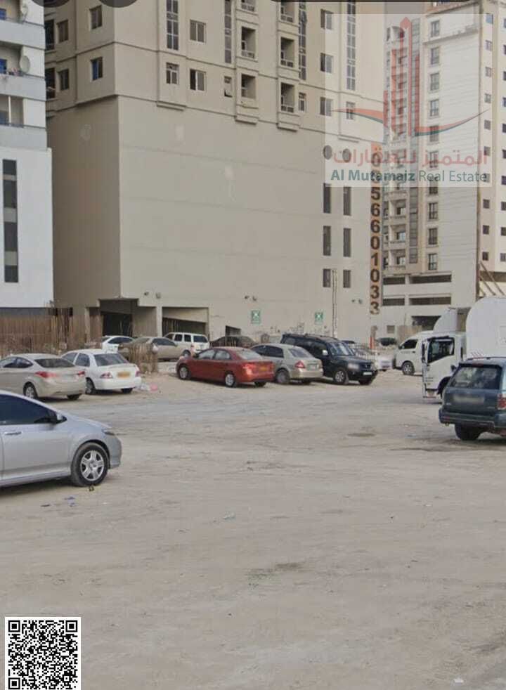 Land for sale in Ajman, Al Rashidiya 3, residential/commercial (G+6), area 11,450 sq ft, corner plot on two streets, excellent location. Asking 4.2M