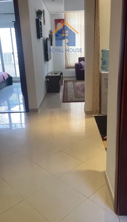 For sale: One bedroom and living room with a side view of Khan Sea.