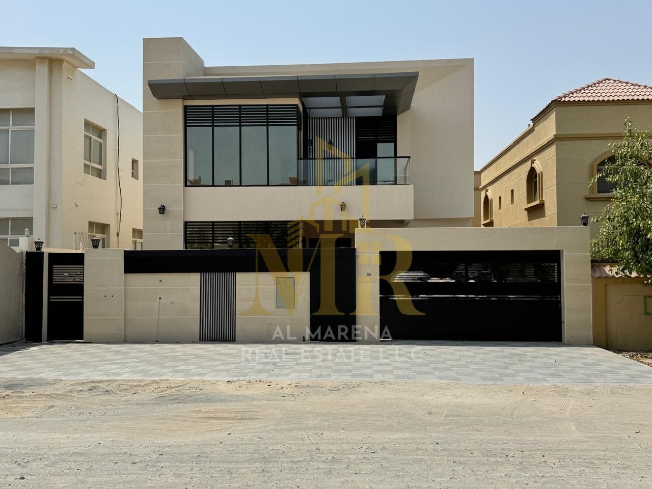 Luxury villa for sale in Rawda 2, commercial use, 5 master bedrooms, majlis, and 2 living rooms. Price includes electricity, water, and air conditioni