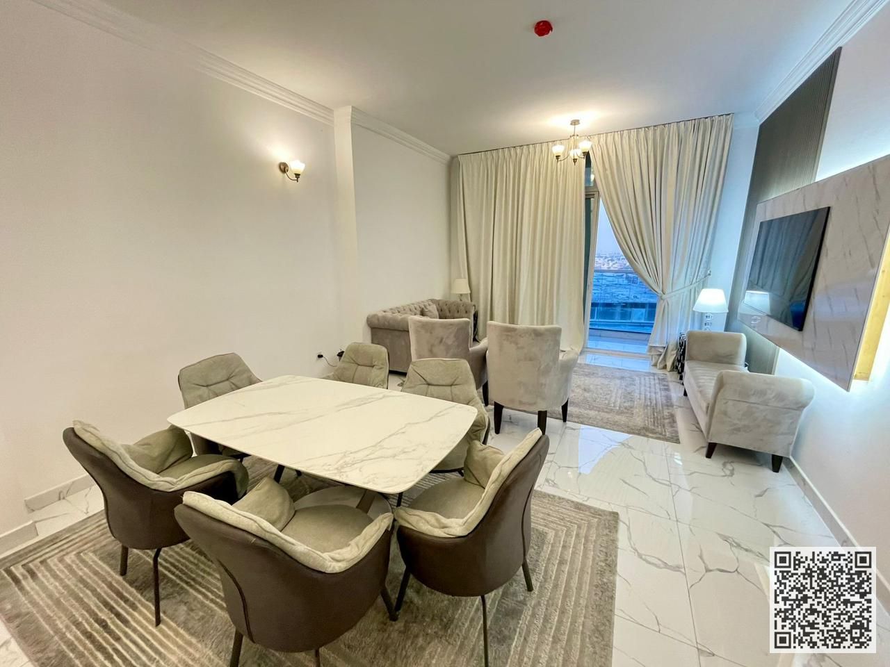 With an open view, a furnished Two-bedroom apartment with a living room is available for monthly rent in Ajman with Gym, pool, parking