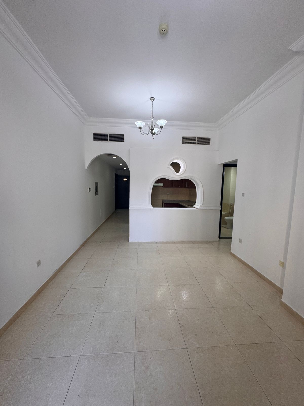 A spacious 2-bedroom apartment with a living hall is available for annual rent in Emirates City