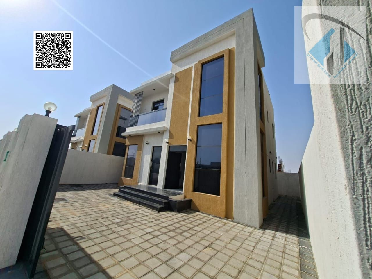 Corner villa with minimal down payment, behind services, close to the mosque, freehold for all nationalities