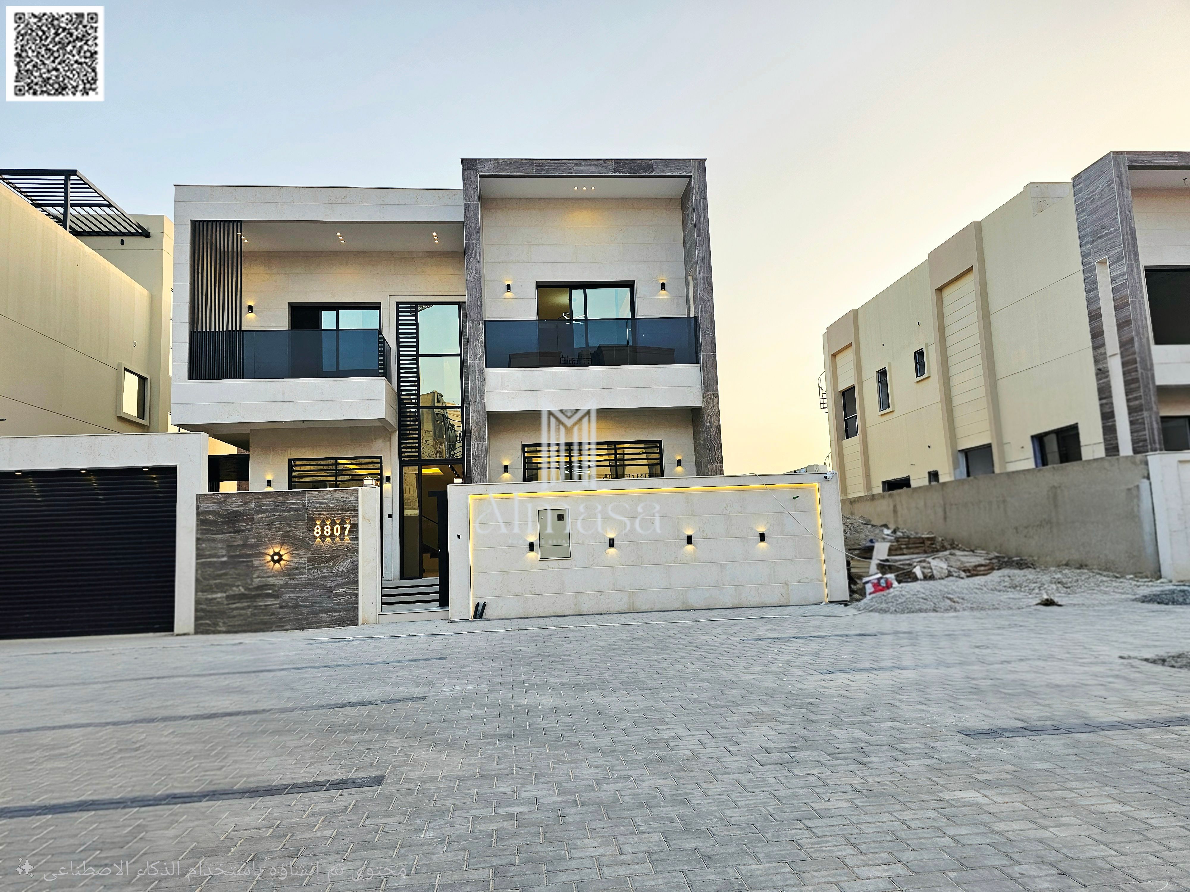 Modern villa with a stone facade, very luxurious finishing, large frontage in front of the villa, side street.