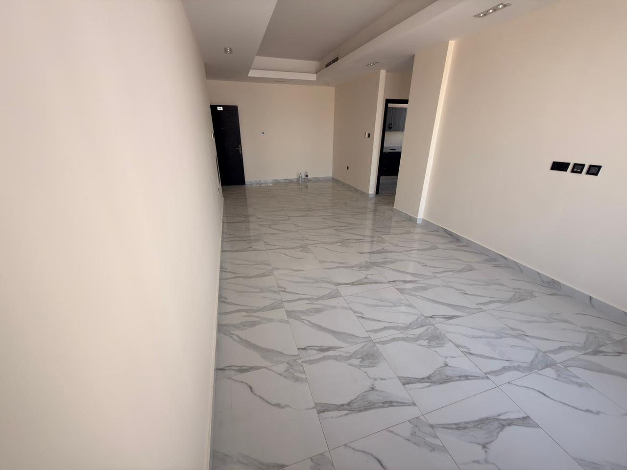 Second tenant, one bedroom and living room for annual rent in Al Jurf 3, Ajman, with new finishes, large spaces, prime location, central air condition