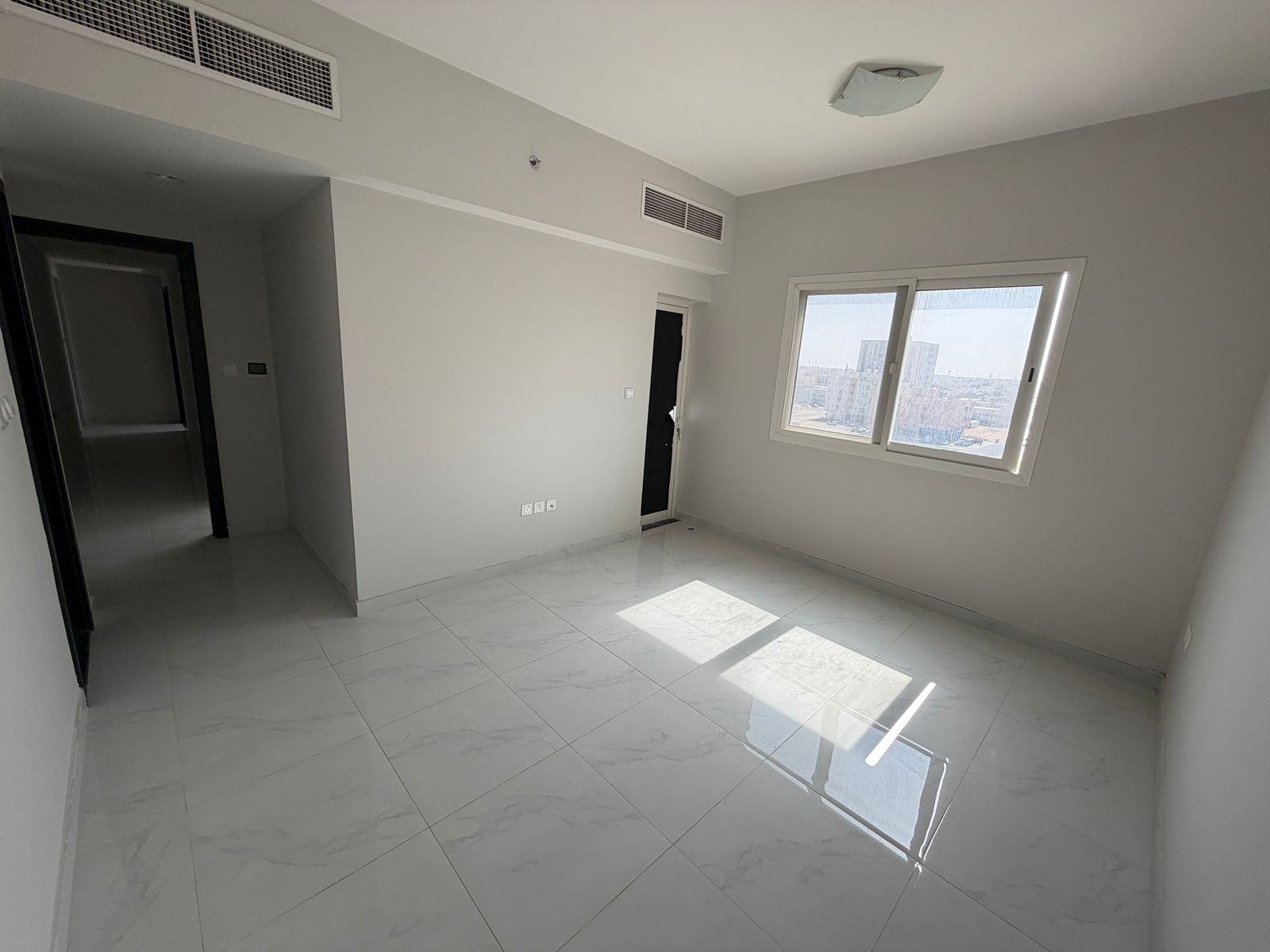 Beautiful two-bedroom apartments with a living room, excellent location, top-notch finishes, and free maintenance by the owner.