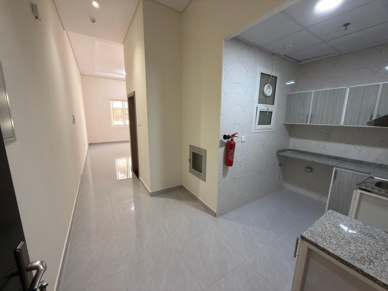 Brand New Studio Apartment for Annual Rent in Al Rawda 2 – First Occupancy, Ground Floor, Strategic Location
