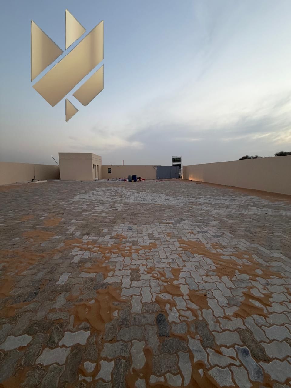 For Rent – Yard in Al Sajaa Prime strategic location Fully fenced Interlock flooring Spacious area Electricity: 24 kW Office for business operat