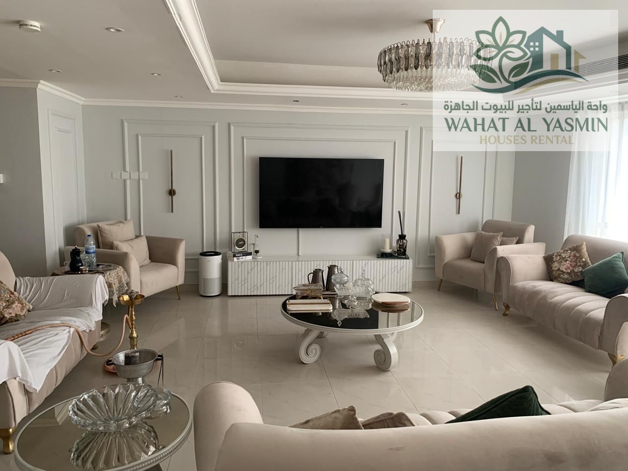 Four bedrooms, two of which are master suites, a living room, a maid's room, and a dining room.