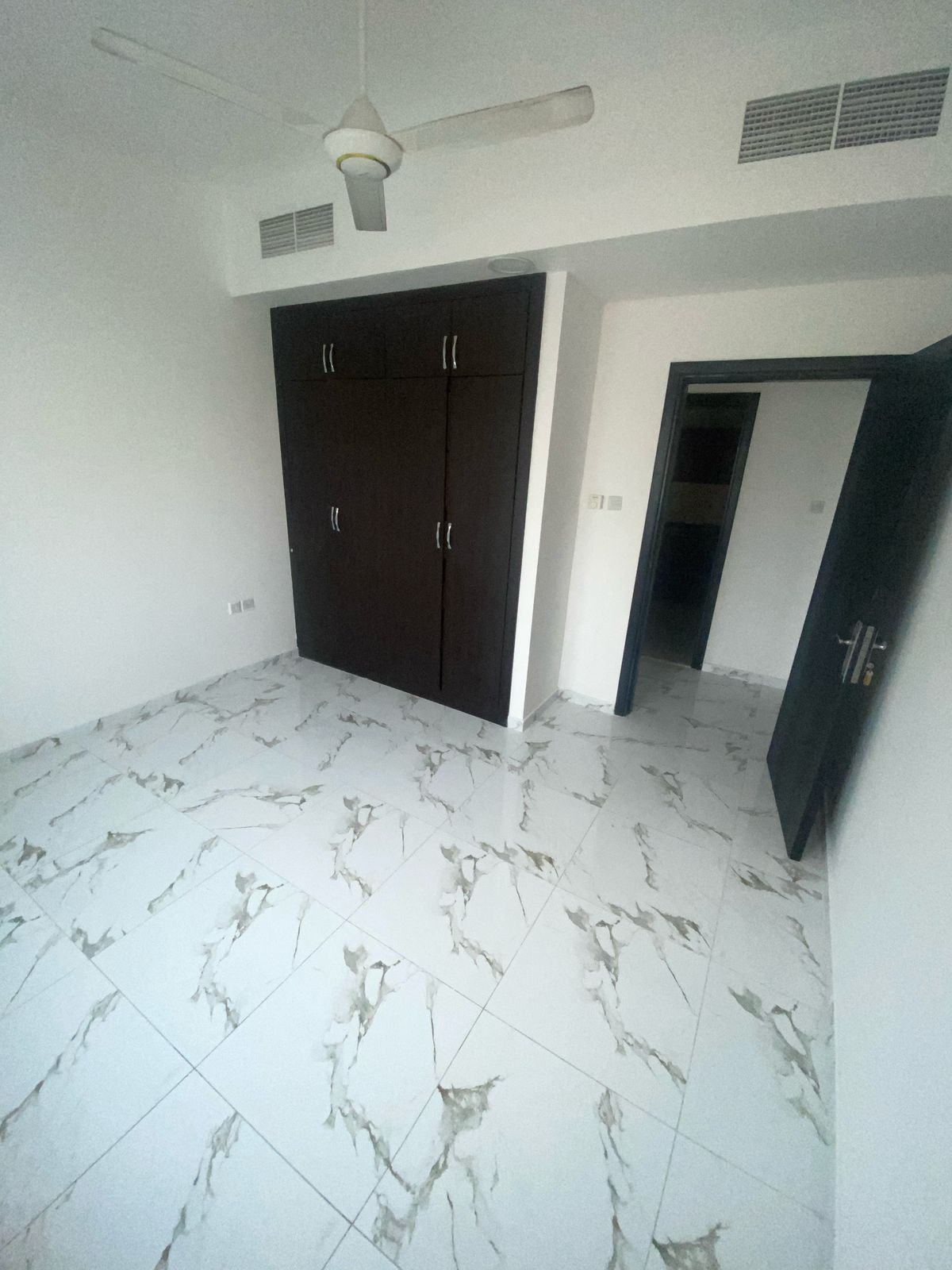 Two rooms and a hall, second tenant in Rashidiya 2, behind the Ladies' Garden