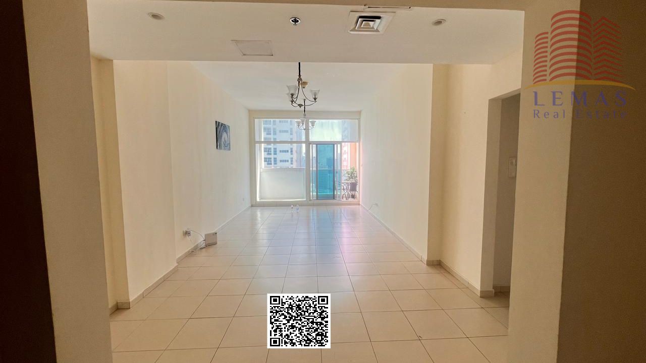 Two bedrooms, living room, closed kitchen, garden view