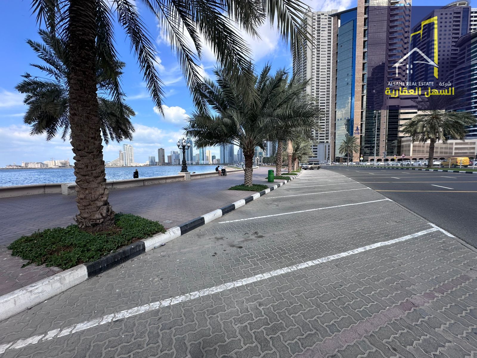 For sale: Residential/commercial land plot in a prime location with a full sea view overlooking Al Khan Lake, Sharjah. Tower permit available.