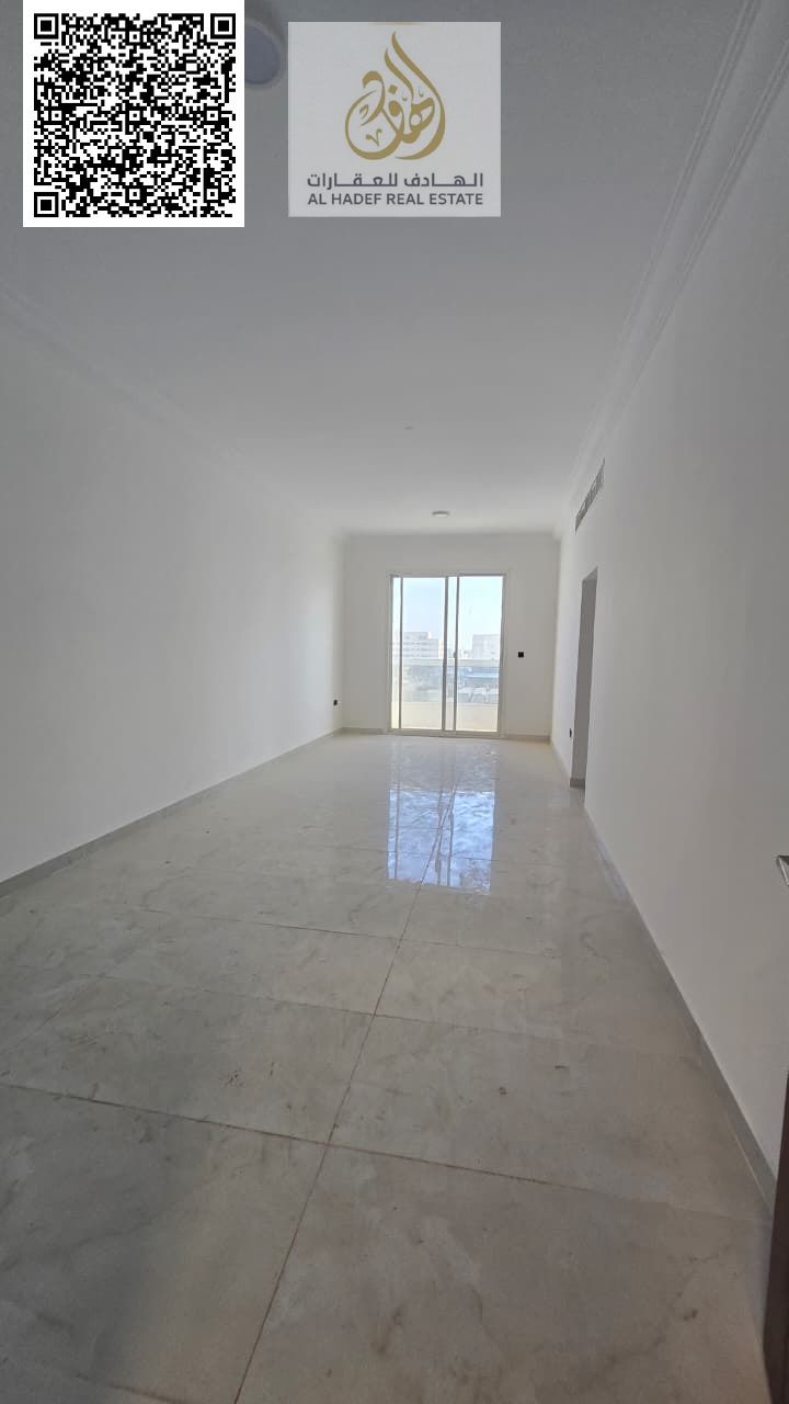 Two-bedroom apartment with a living room for annual rent in Al Rawda 3, first occupancy, very spacious. For annual rent in Ajman, suitable for famili