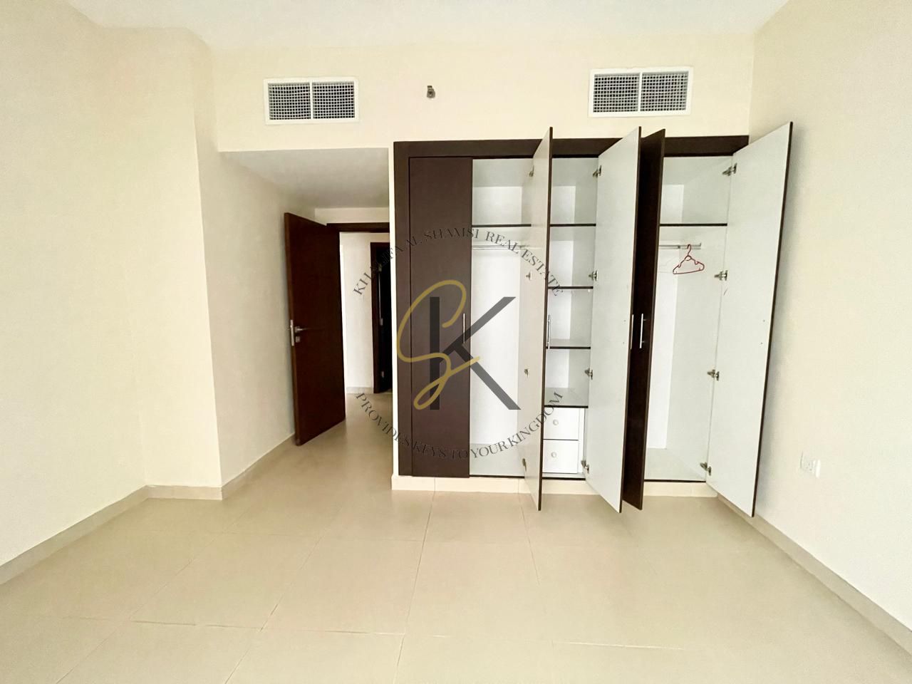 Spacious Unfurnished 1BHK with Balcony for Rent in Muwailah Commercial, Sharjah | Prime Location | All Amenities | 950 Sqft