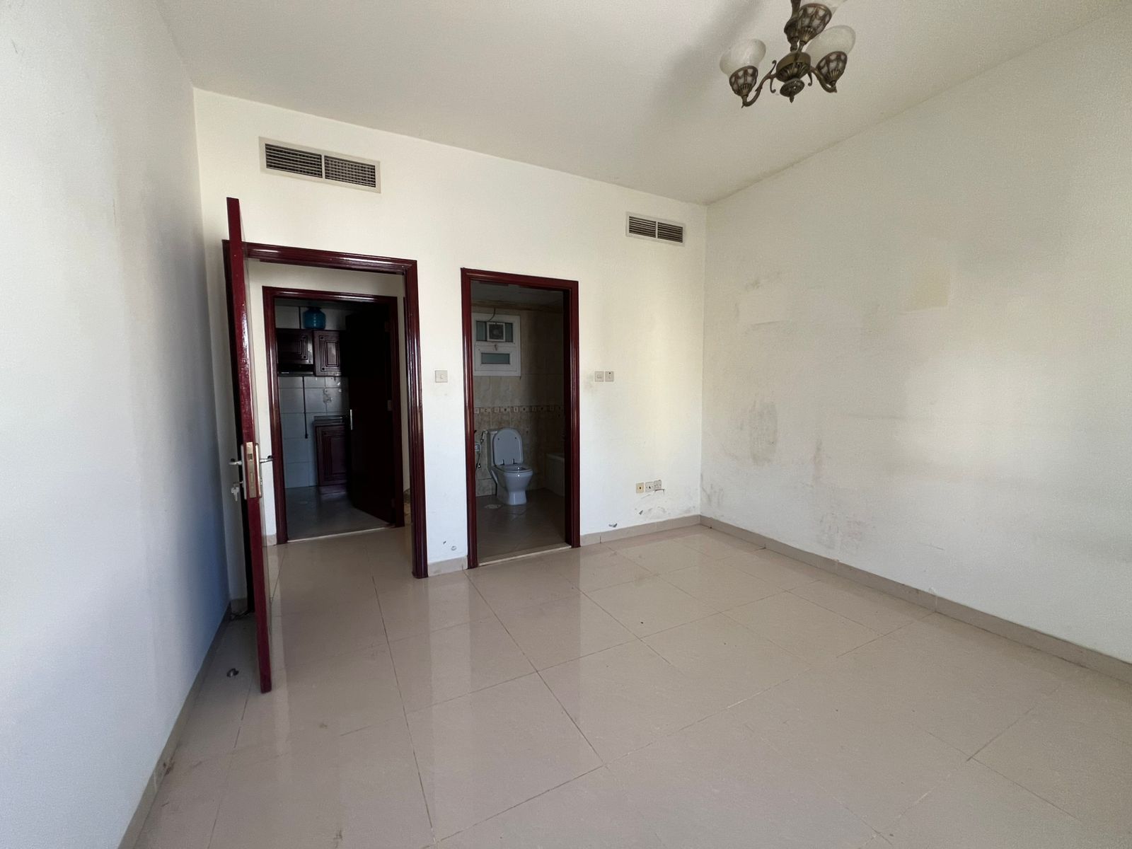 Two-bedroom apartment in Al Qasimia, 2 baths, central AC, 4 payments