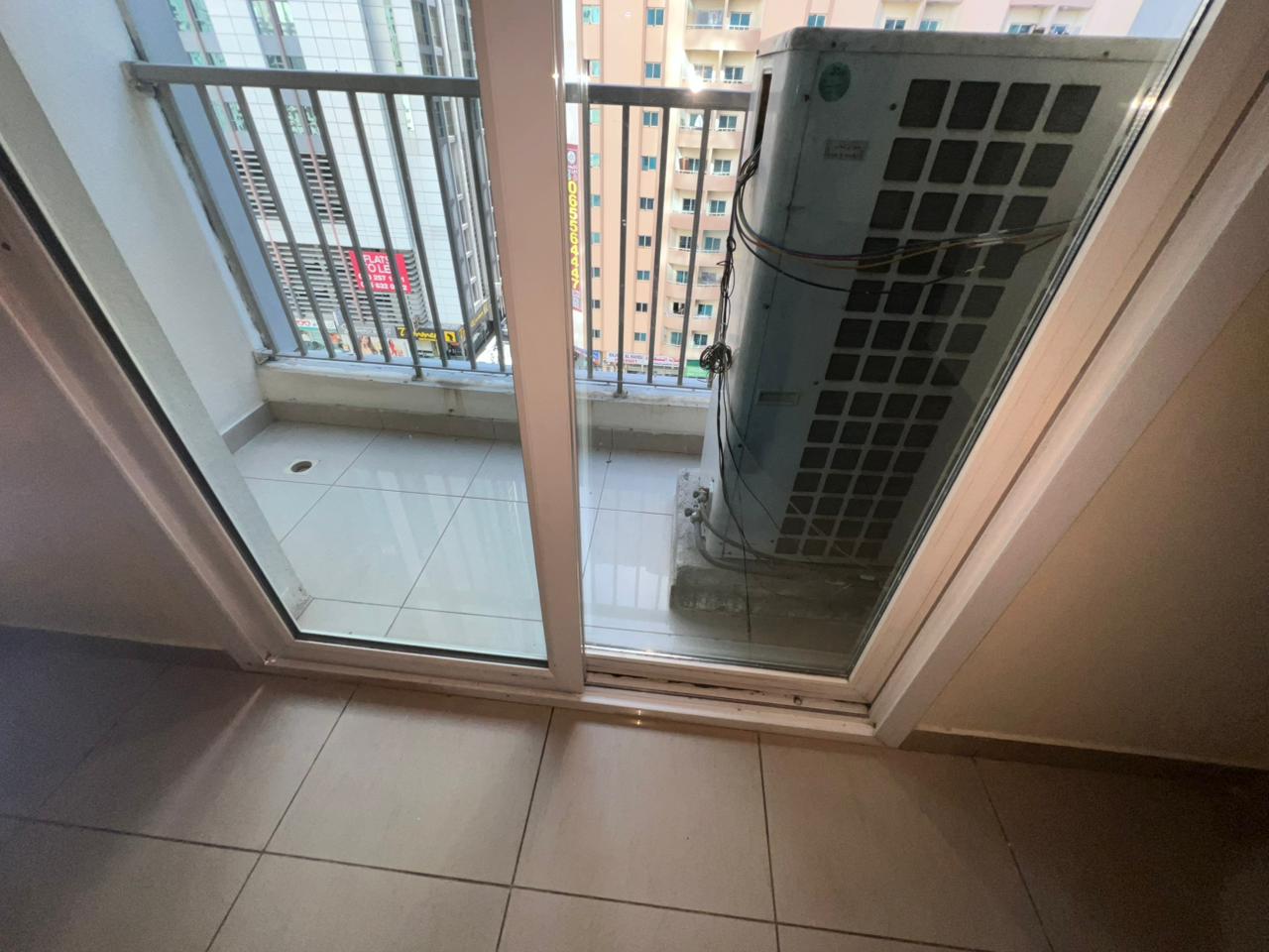 Two-bedroom apartment with balcony in Al Nahda Sharjah, open road view, two bathrooms, near Dubai exit, flexible payment via Tabby & Tamara