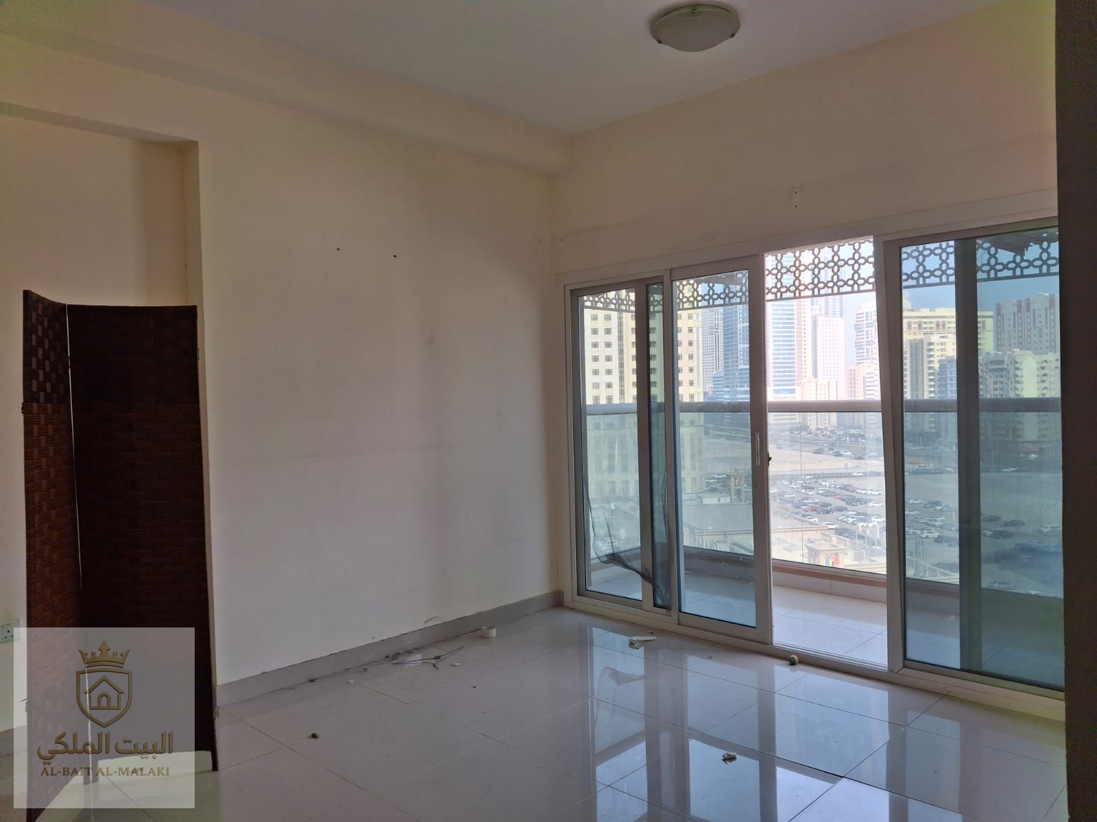 Two bedrooms, a living room, and a balcony in Al Taawun, directly on the Dubai exit. Free parking, beautiful open view, and built-in wardrobes.