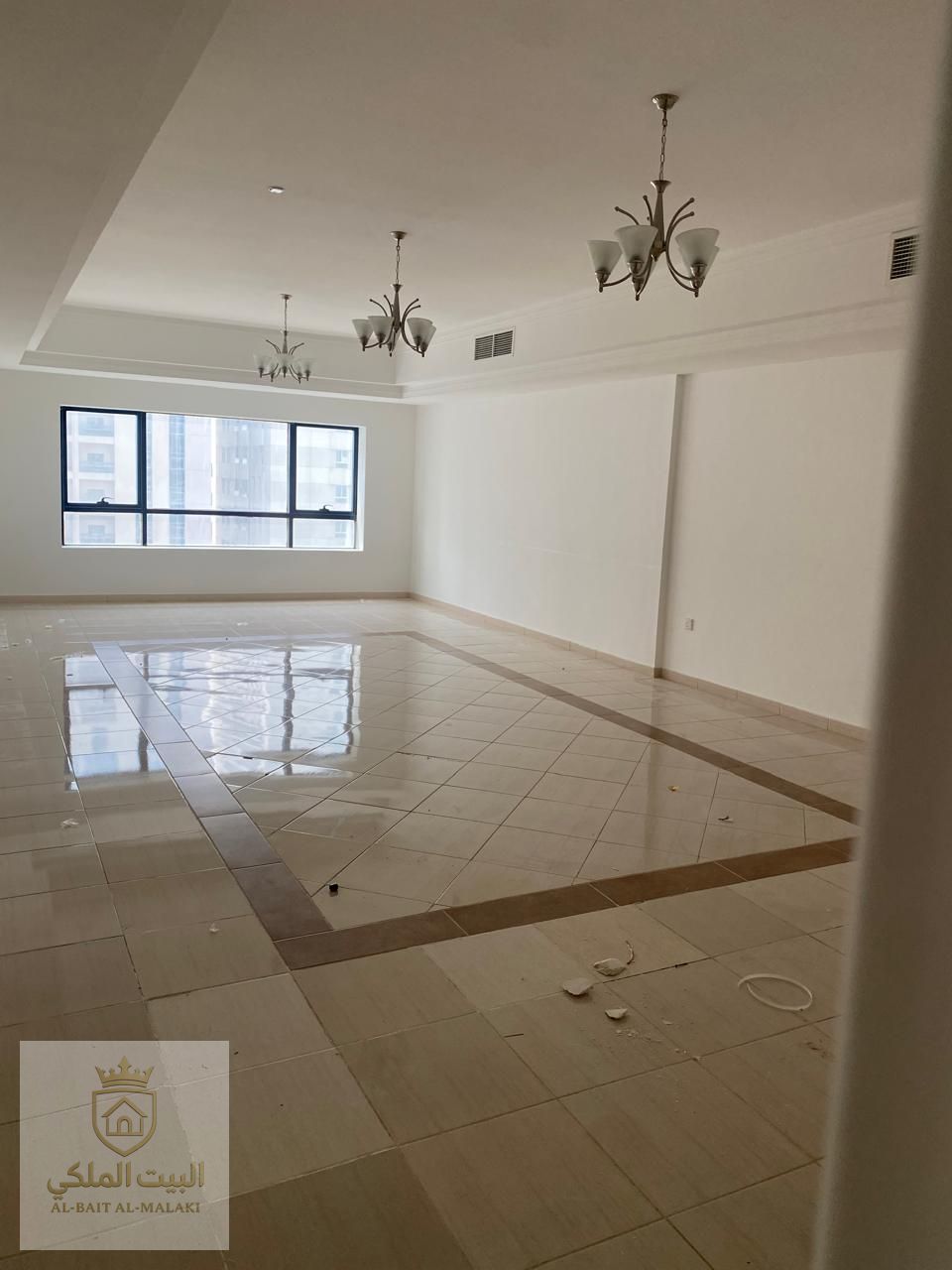 Three bedrooms and a living room with three bathrooms and a small maid's room. Spacious area, free parking, free air conditioning, free gym, free swimming pool, and free games room.