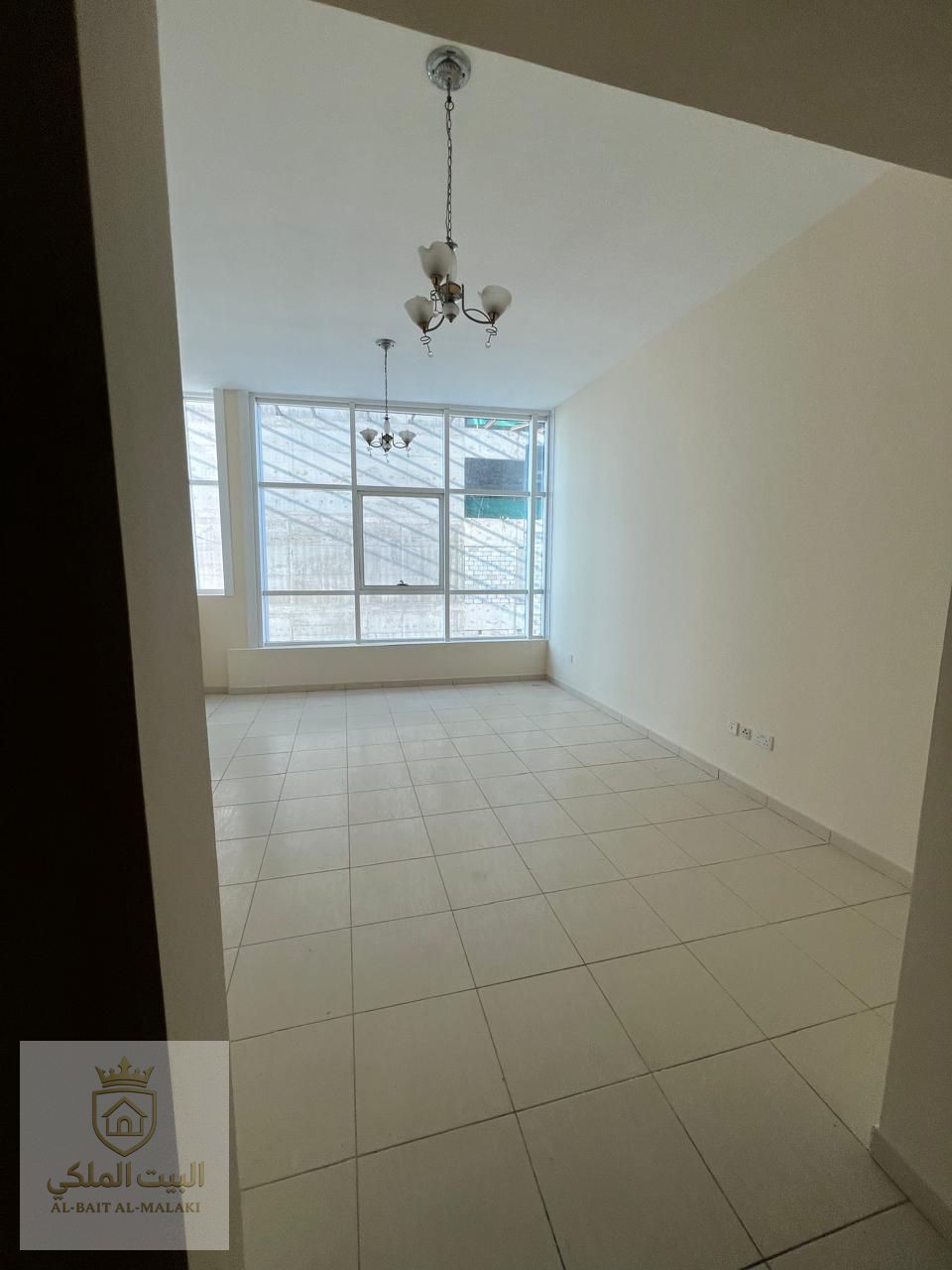 One bedroom and living room in Al Taawun, near Dubai exit, with sea view and two bathrooms.