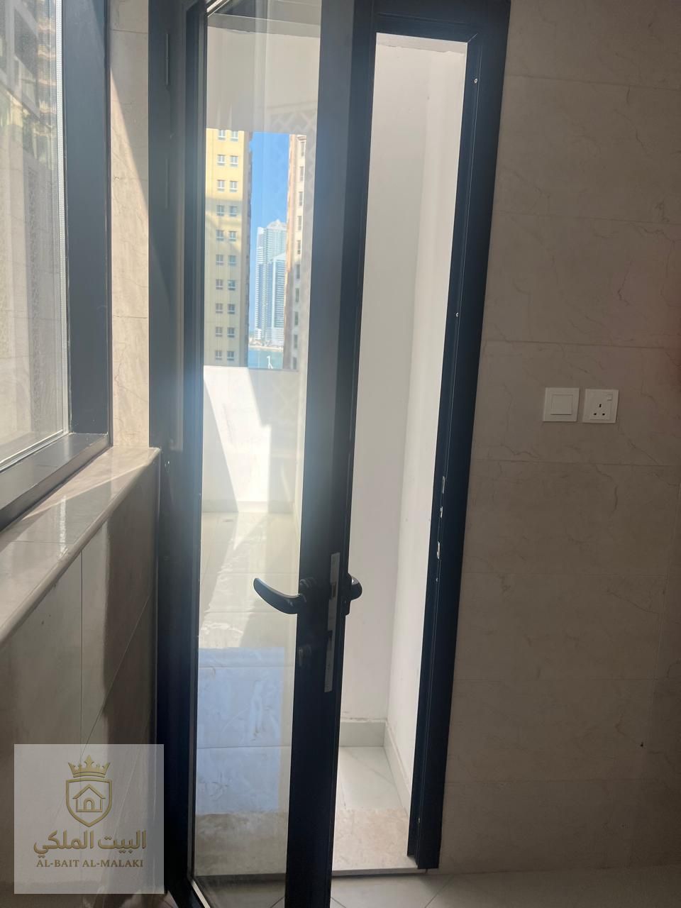 One bedroom and living room in Al Taawun with free parking and an open view. First occupancy, modern tower directly on the Dubai exit. Payment facilities available.