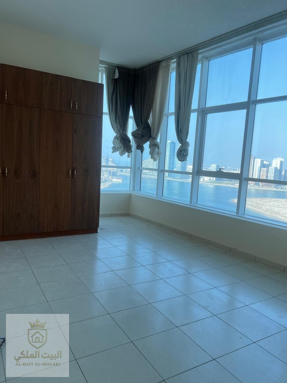 One bedroom and living room in Al Taawun, spacious area, sea view, free parking, contract attestation from the owner, free gym and free swimming pool