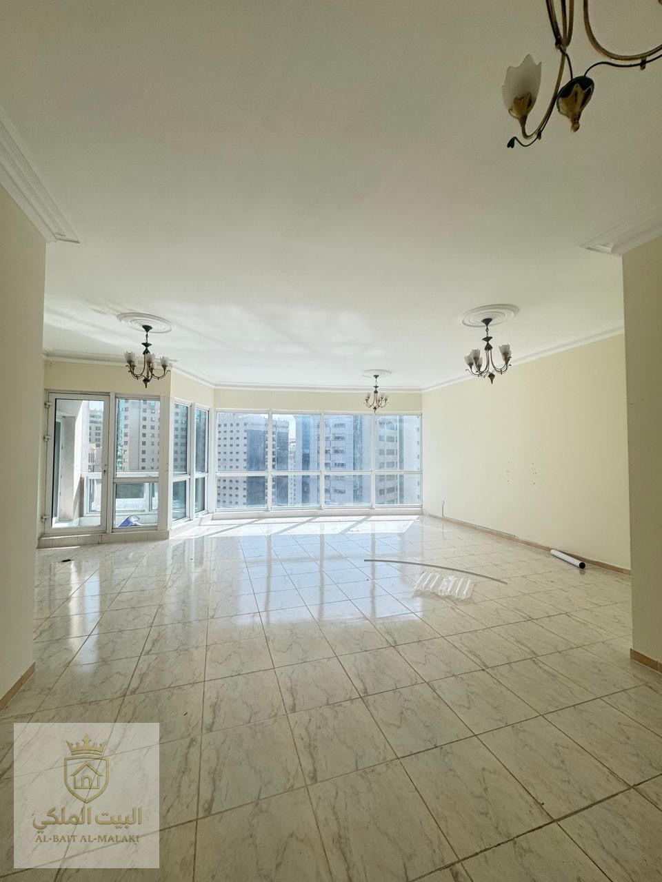 A spacious and well-designed apartment for rent featuring three bedrooms, a living room, a small maid’s room, and a separate laundry room.