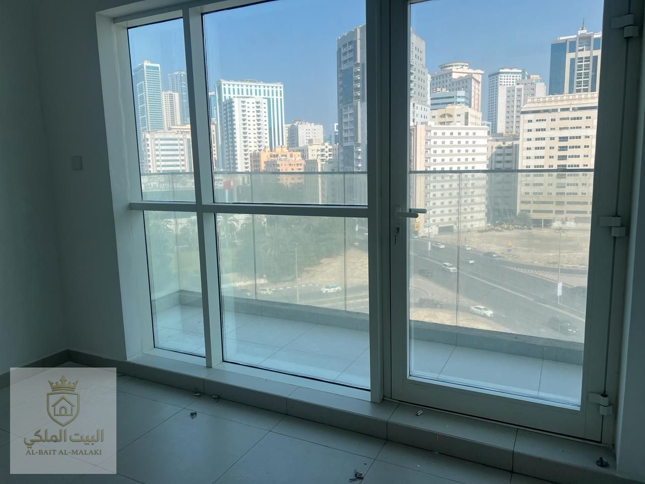Two bedrooms, a living room, and a balcony in Al Taawun, directly on the Dubai exit. Second-occupied building. Super Deluxe. Available in four installments. Close to all essential centers. Shops. Restaurants. 24-hour security. CCTV surveillance. Close to