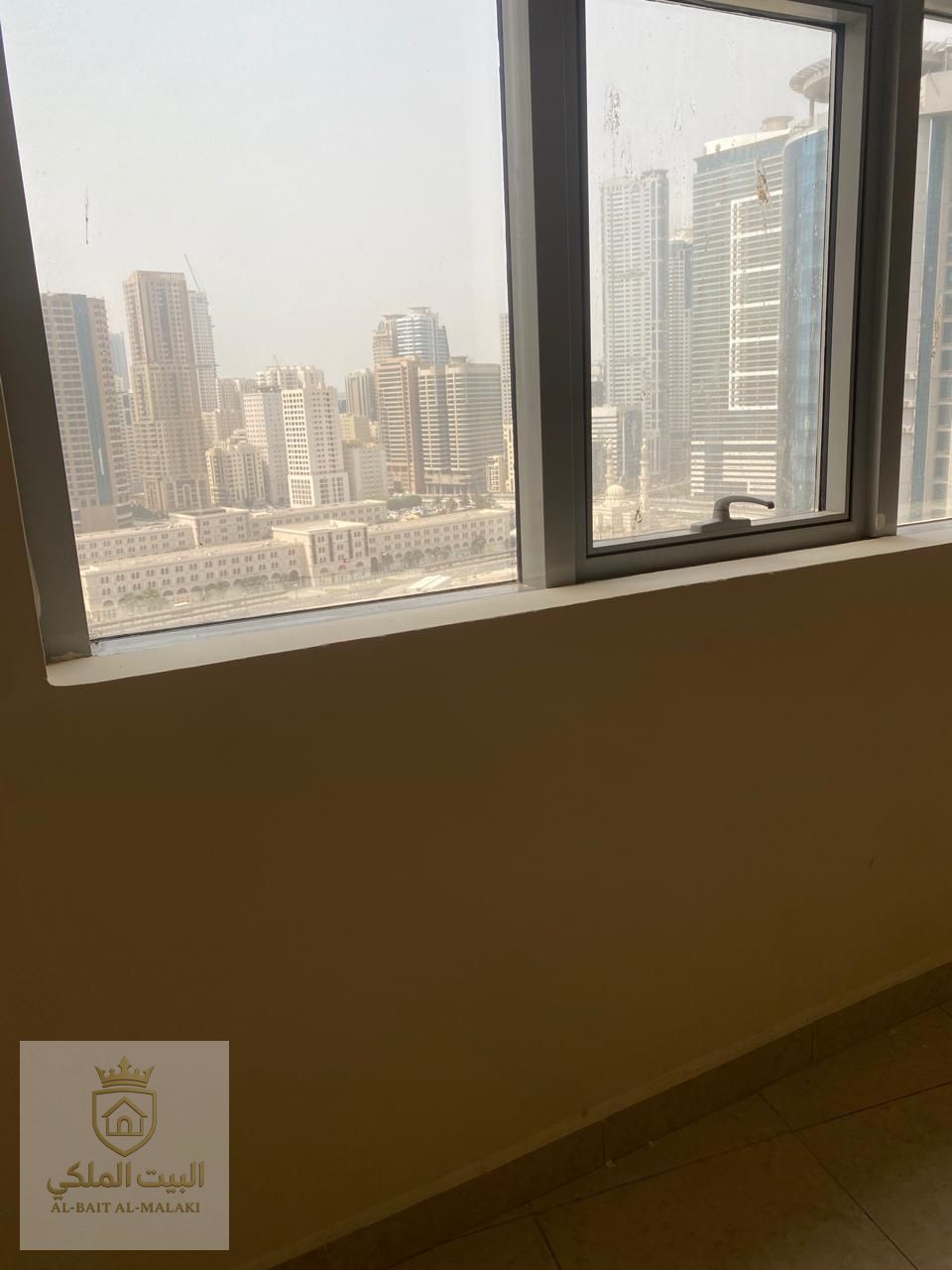 One bedroom and living room in Al Taawun with an open view, modern building. Spacious balcony. Two bathrooms. Payment options available: In four or six installments. Close to all essential services: Shops Restaurants Buses to Dubai 24-hour security CCTV s