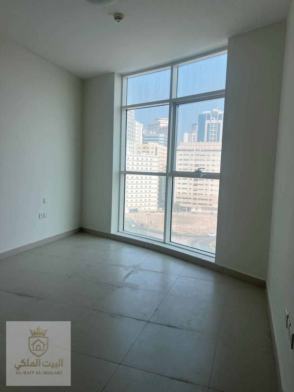Two bedrooms and a living room in Al Taawun, directly on the Dubai exit. Master bedroom and guest bathroom. Panoramic view. Second occupied building. Super deluxe. Payable in four installments.