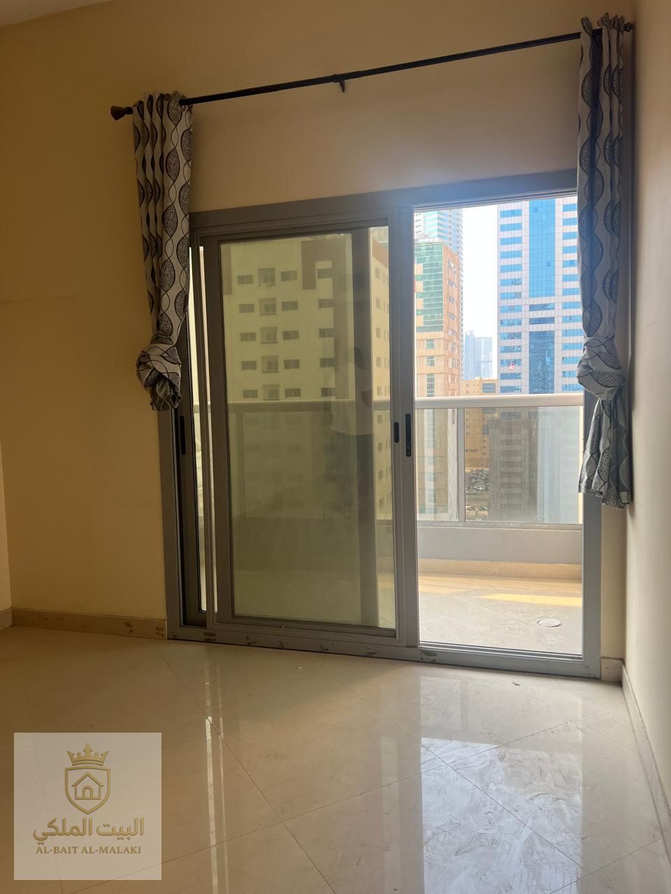 Two bedrooms and a living room in Al Taawun, right on the Dubai exit. Spacious area with a balcony. Beautiful open view. Near D2D Al Taawun. Available in four or six installments.