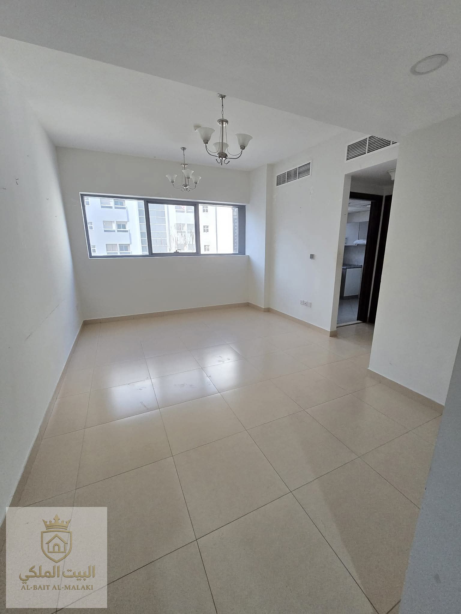 One bedroom and living room in Al Taawun Located in Taani Place directly on the Dubai exit Payable in four installments Spacious area Built-in wardrobes Two bathrooms