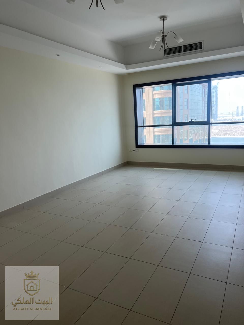 One bedroom and living room for rent in Al Khan on Al Qasba Canal, air conditioning included, rent 52,000 dirhams.