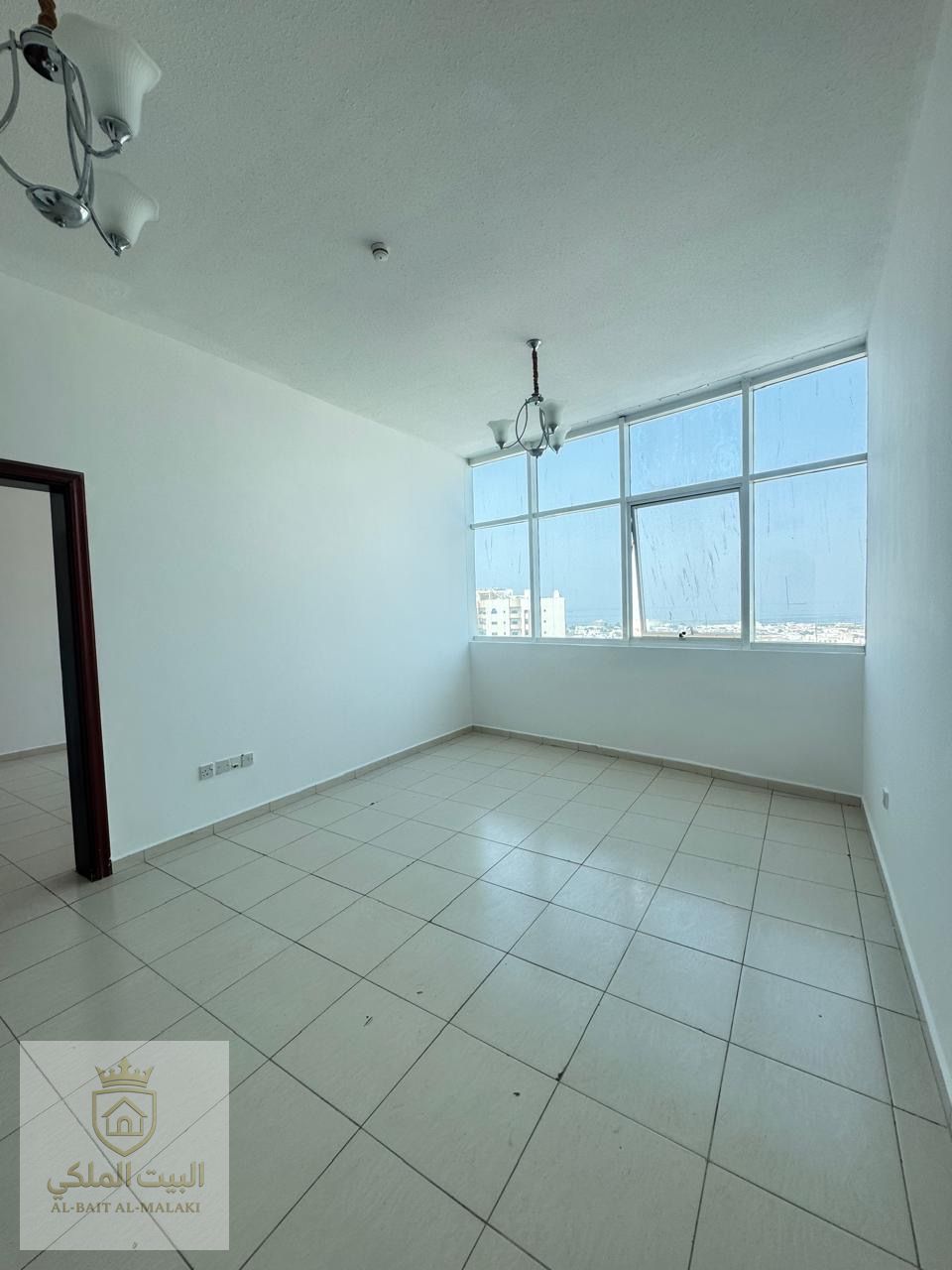 One bedroom apartment for rent in Al Majaz 3, located in a prime and lively area. The apartment features an open and beautiful view, offering a comfortable and relaxing living environment. It has a spacious layout with a well-designed living area and incl