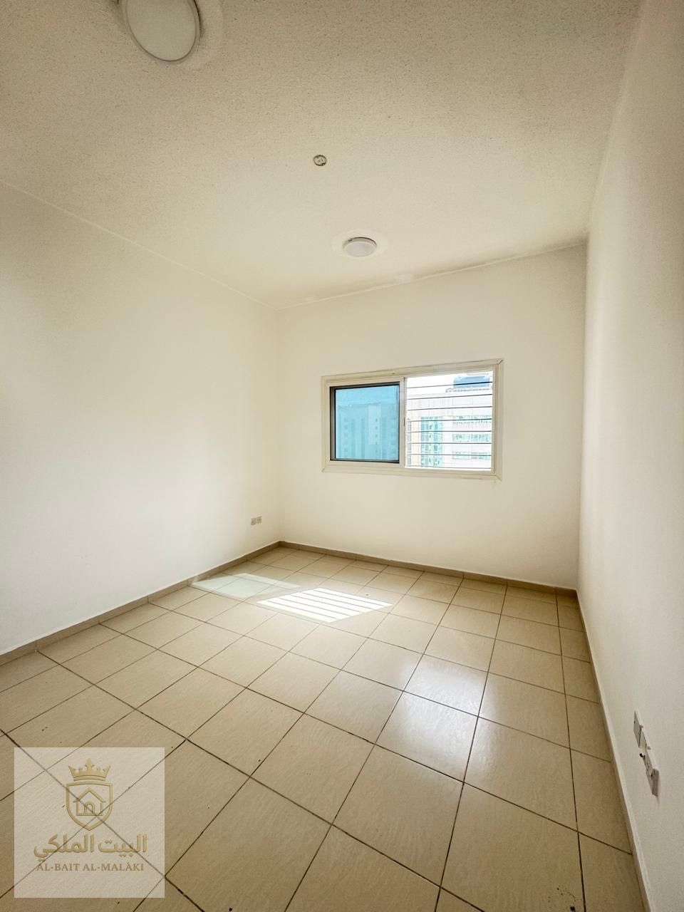 one bedroom apartment for rent in Al Majaz 3, located in a prime and lively area. The apartment features an open and pleasant view that provides comfort and a relaxing atmosphere. It offers a well-planned layout with a large living space and includes 2 ba