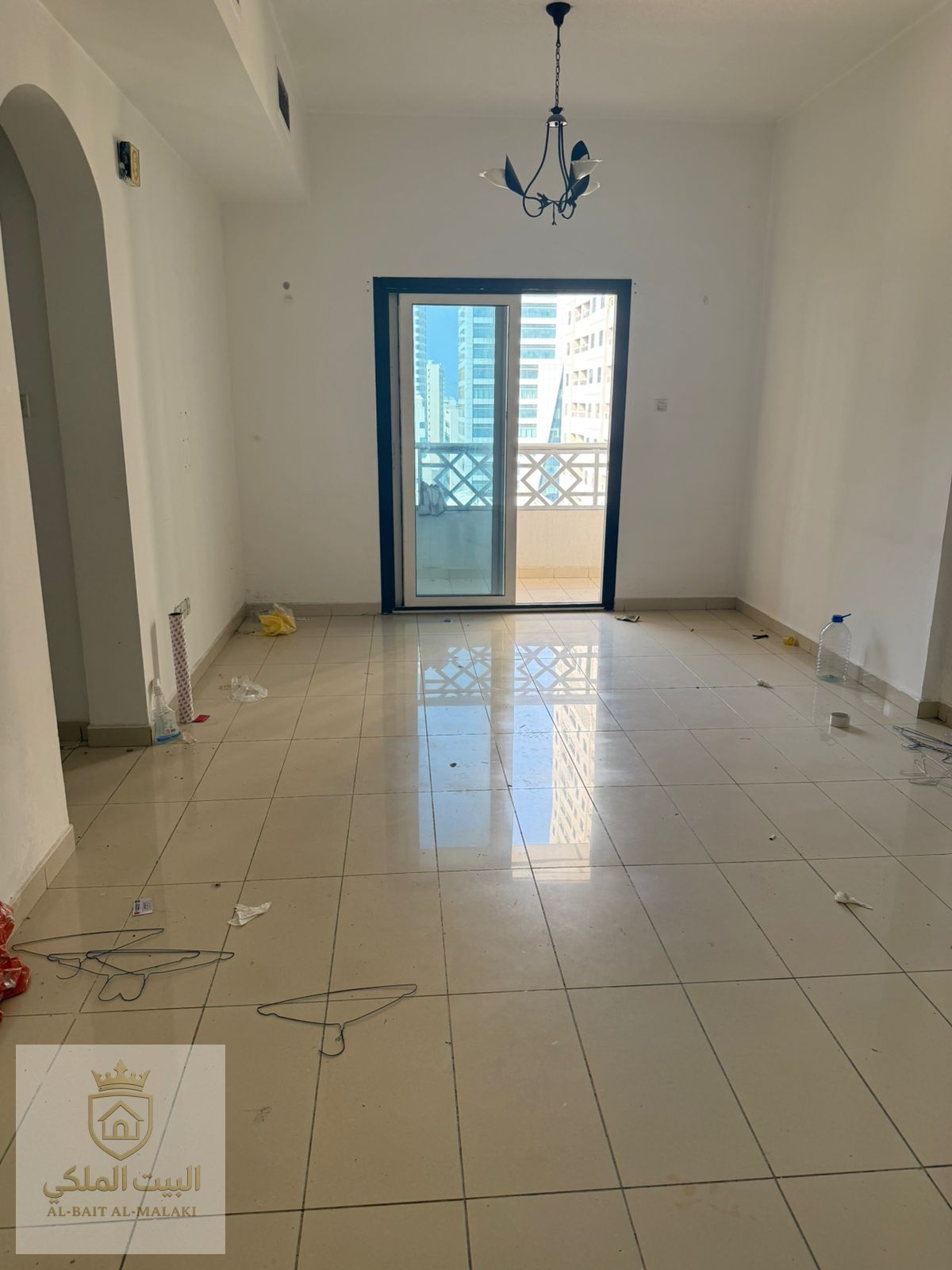 A room and a lounge with a balcony in Al Qasba, a large area, an open view and facilities in payment