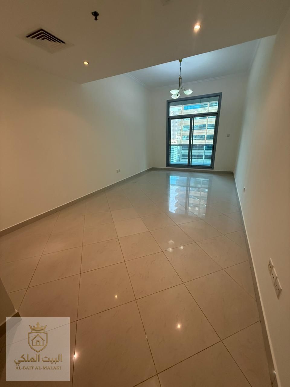 One-bedroom apartment in Al Majaz 1 with a stunning open and beautiful view, offering a direct sea view that creates a relaxing and peaceful atmosphere. The apartment features a spacious