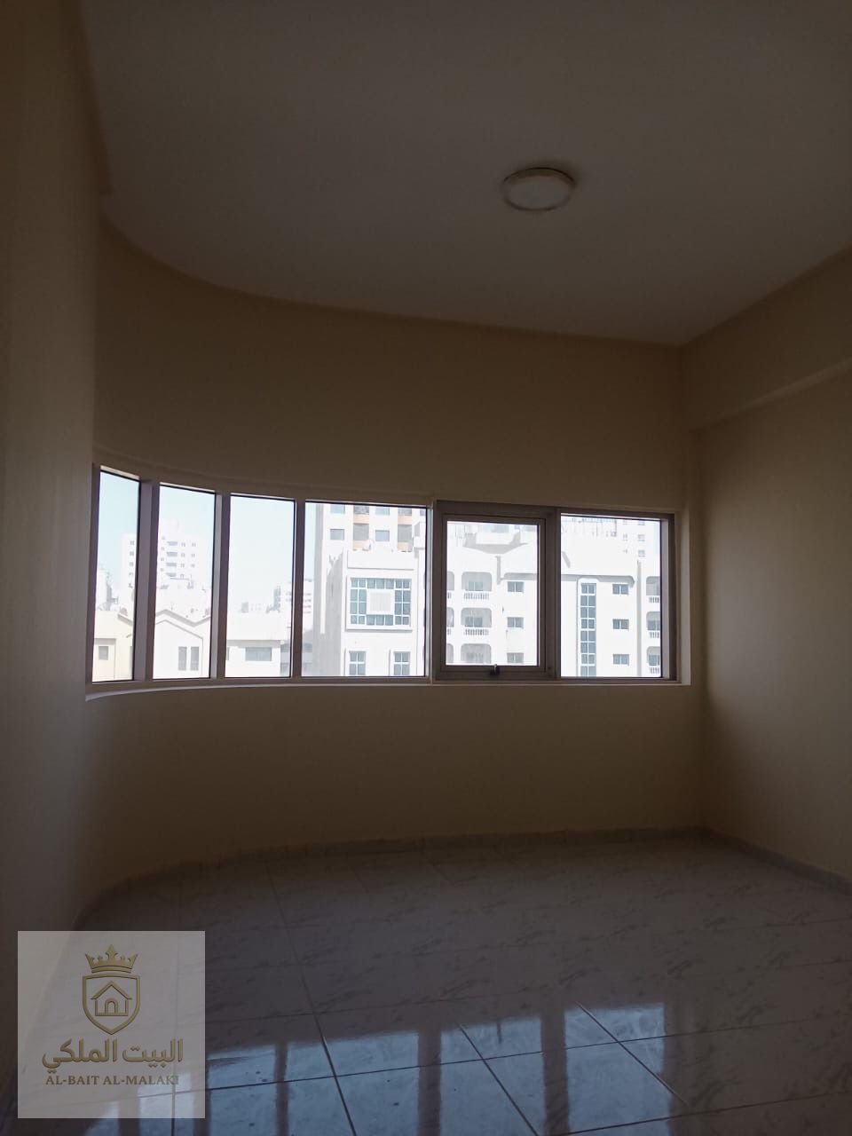 One bedroom apartment with a living room for rent in Al Qasimia Al Nad, located in a quiet and convenient area close to all essential services such as supermarkets, restaurants, and public transportation. The apartment offers a practical layout with a com