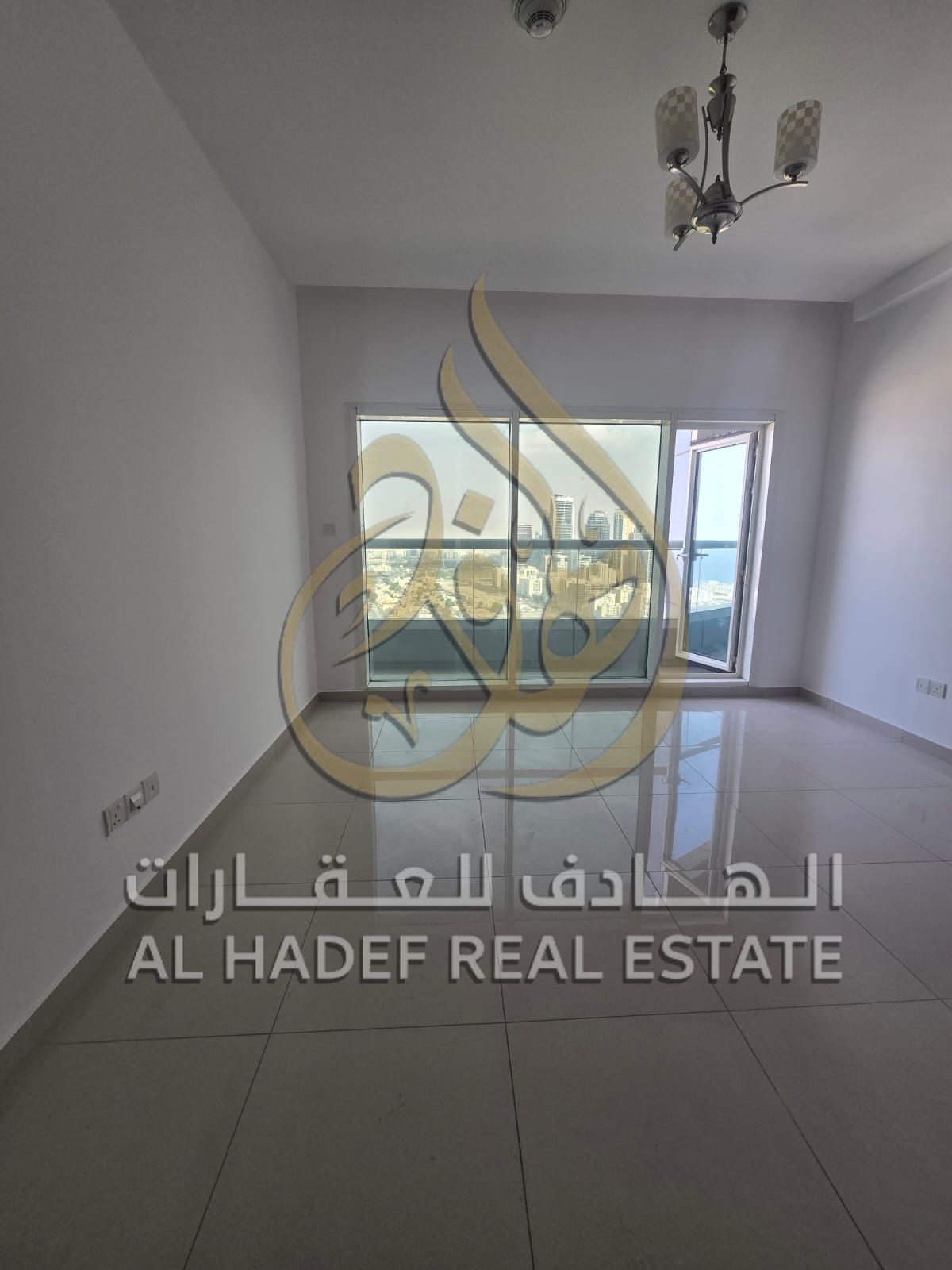 Two-bedroom apartment with a master bedroom and living room, plus a maid's room with free parking in Khan