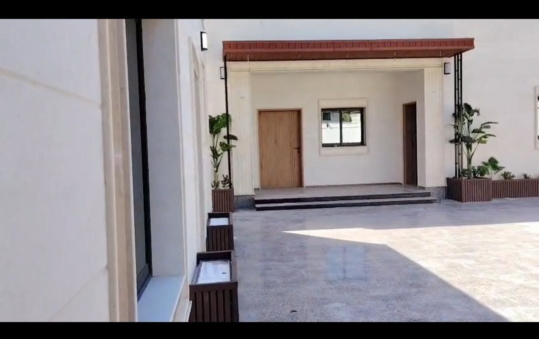 Villa for sale in Sharjah, Al Mansoura area. Single-story villa on a corner lot with two street frontages.