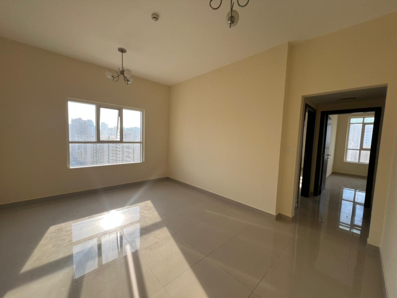 Largest 2BR + living in Abu Shaghara | Second tenant | Free parking | Built-in wardrobes | Central AC | Prime location | Dubai exit