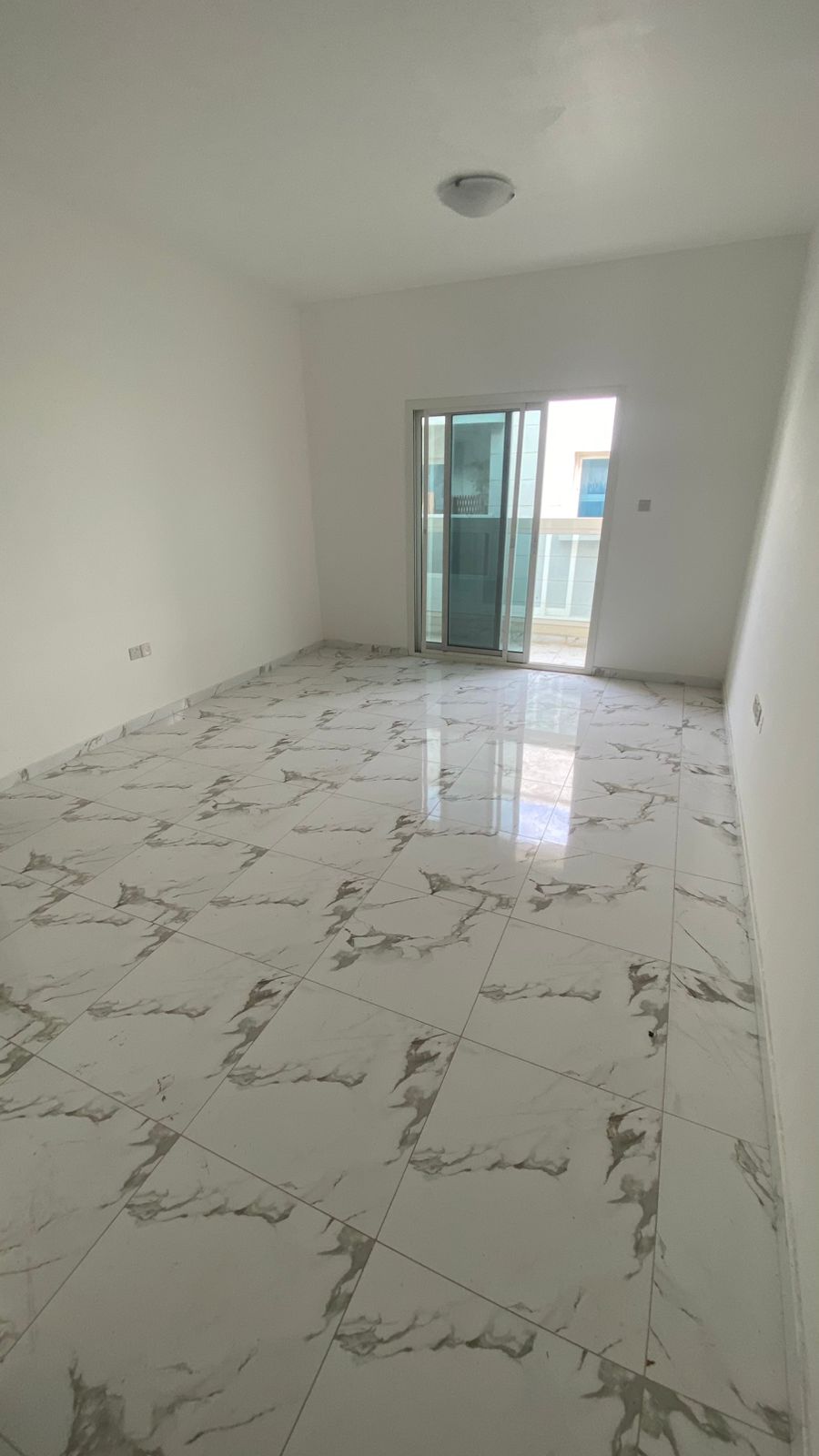 One bedroom and a living room, two bathrooms with wall closets in Al-Rashidiya 2, behind the Ladies' Garden.