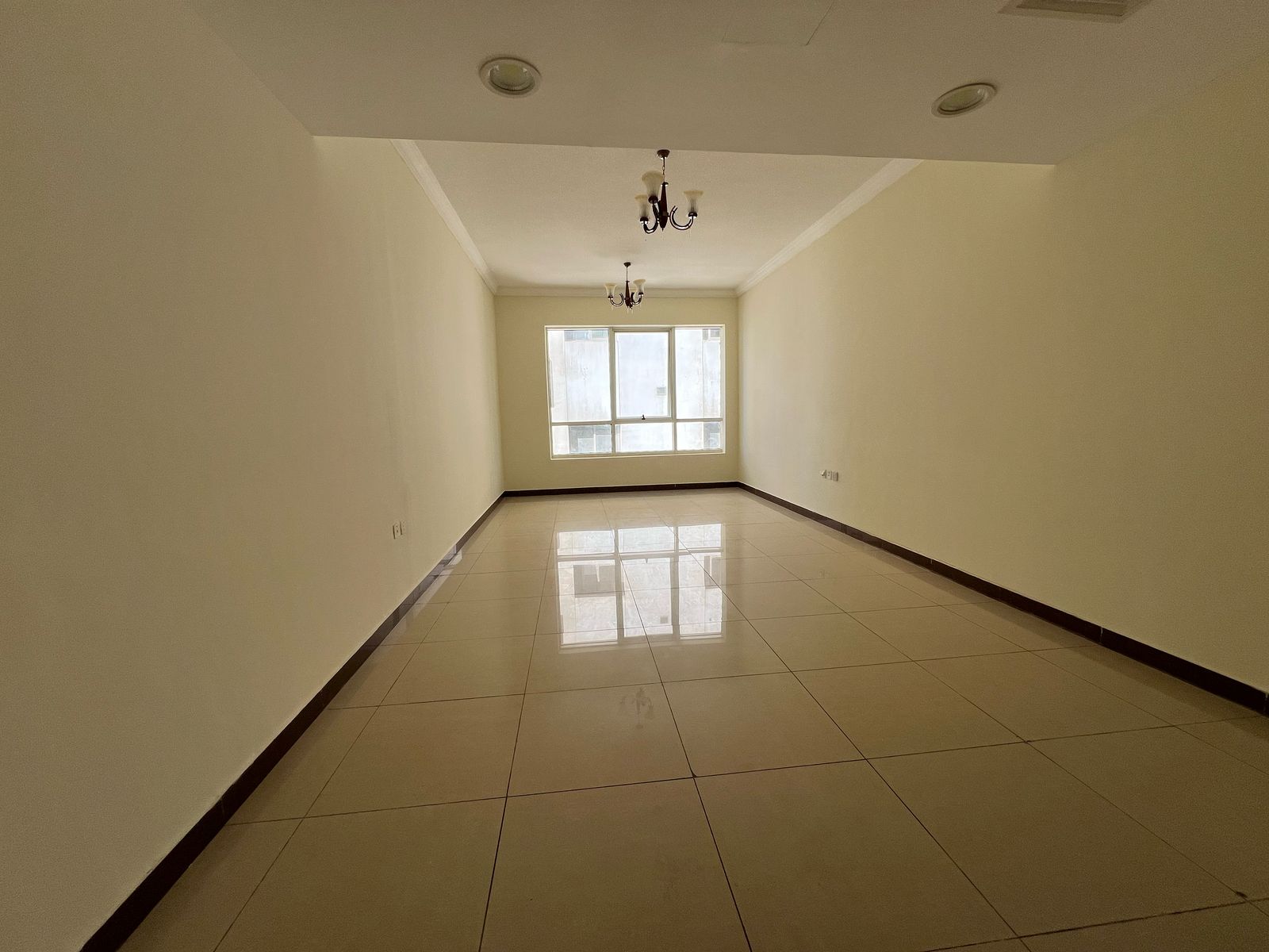 Free parking, balcony with open view, 2 bathrooms, central AC & gas, spacious rooms.